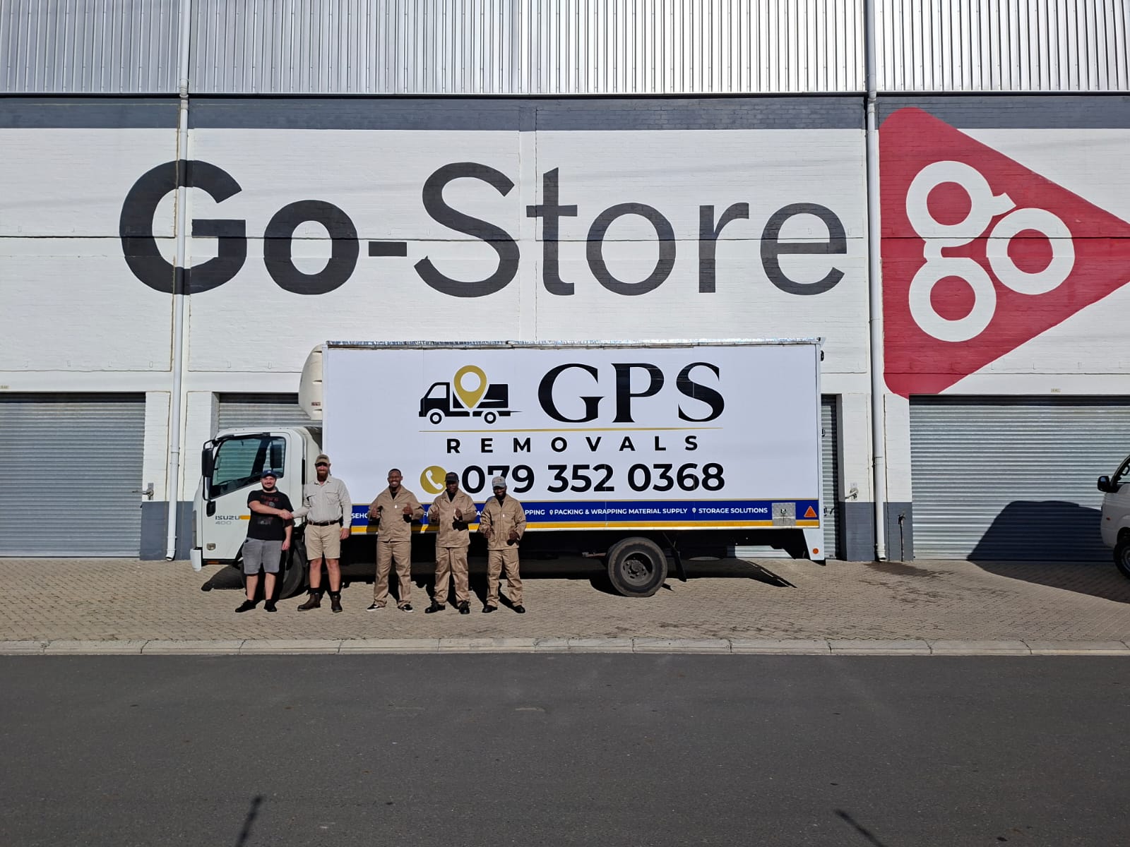 The GPS Removals crew in front of the truck